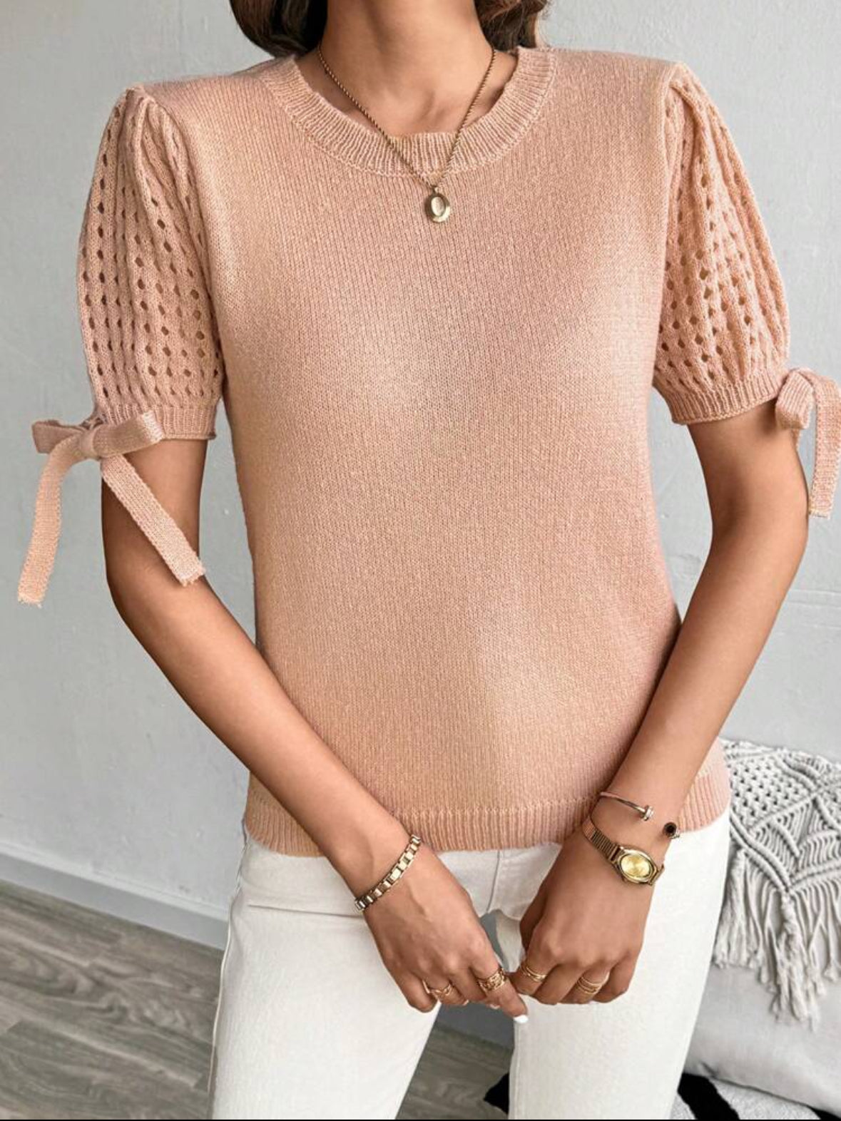 Pull tricoté à nœud