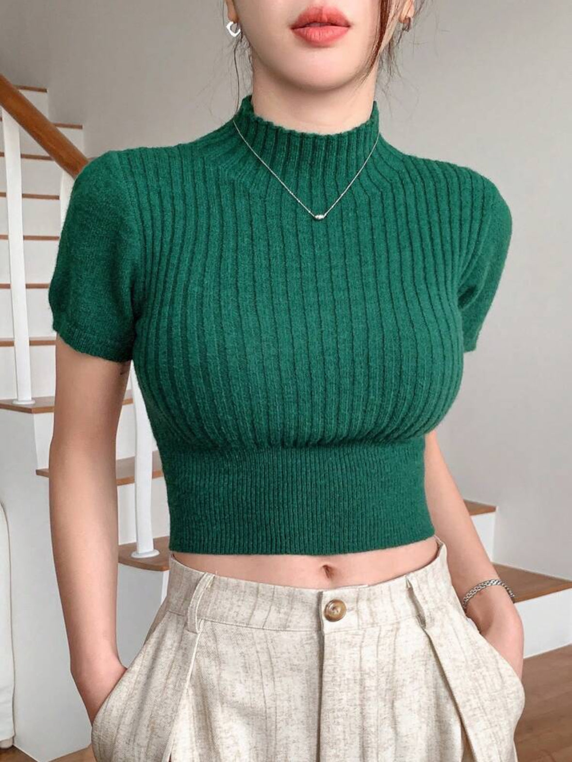 Pull tricoté col montant