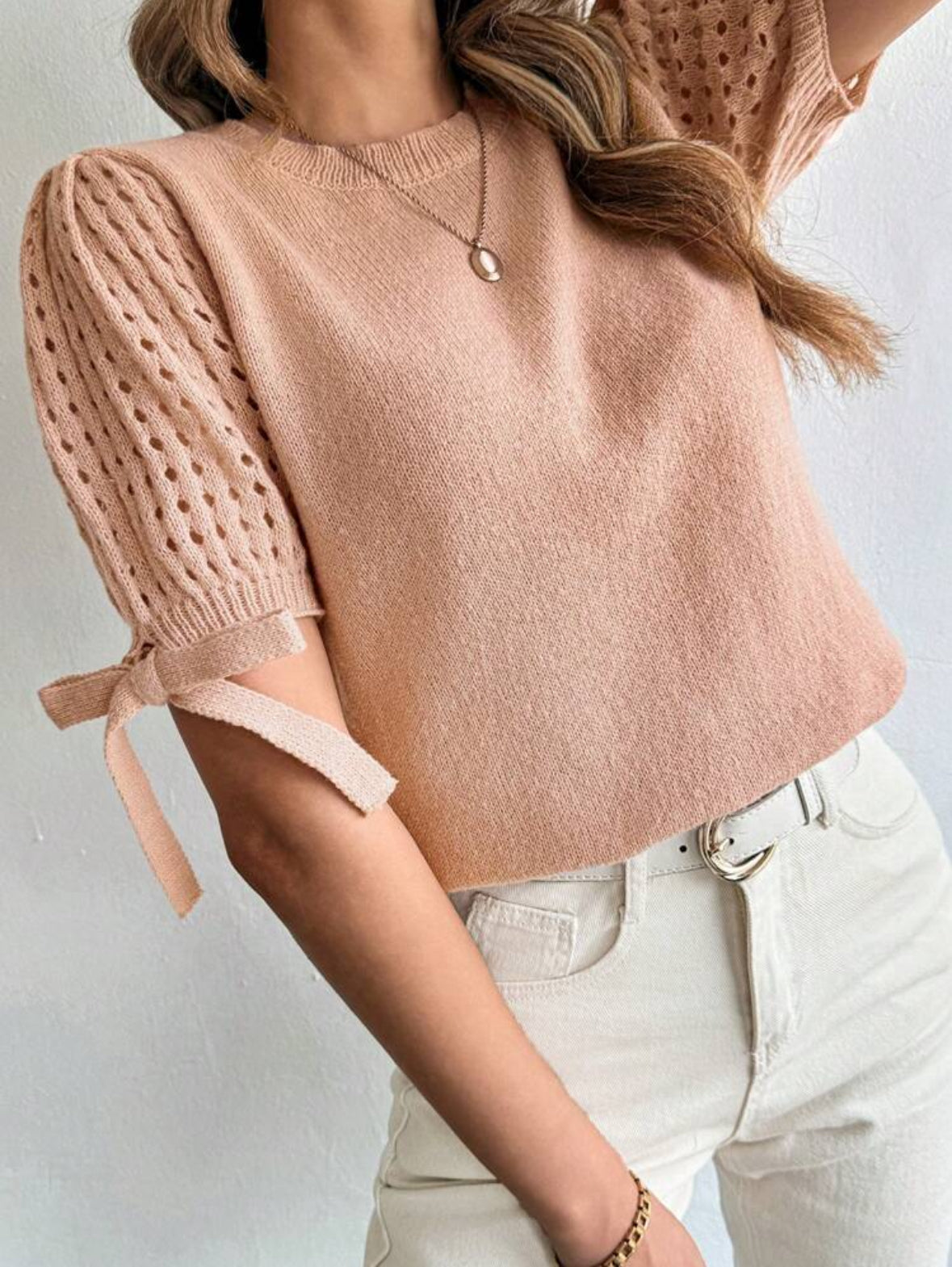 Pull tricoté à nœud