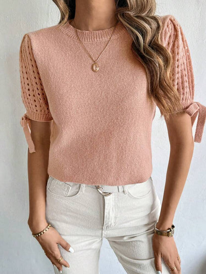 Pull tricoté à nœud