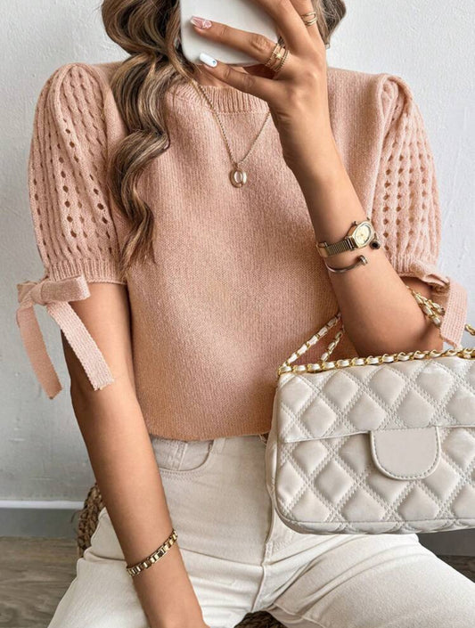 Pull tricoté à nœud